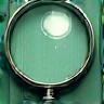 Magnifying glass checking clothing quality